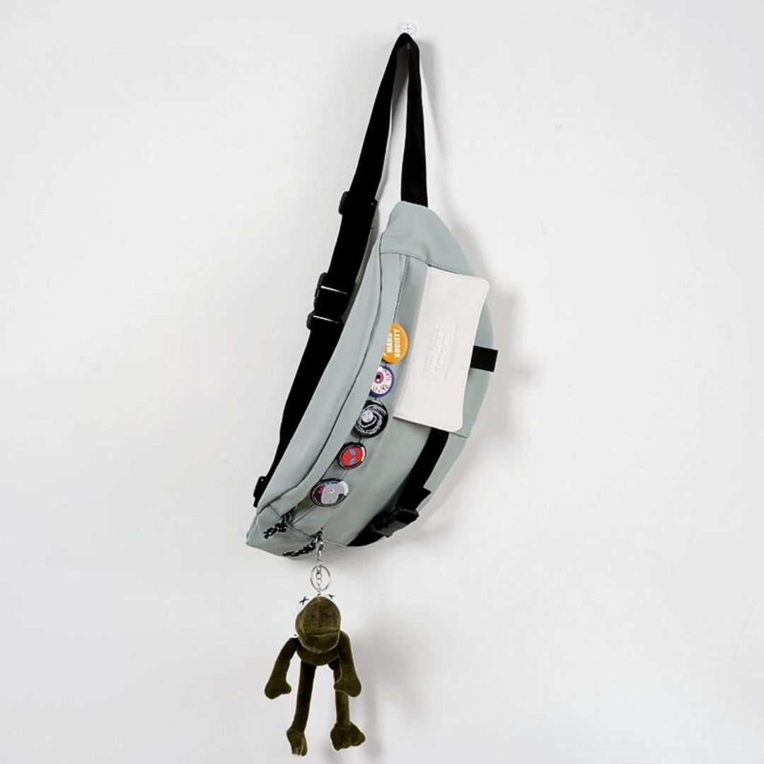 Unisex crossbody bag for travel and hiking with adjustable strap and free pendant