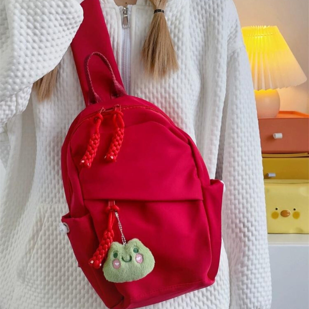 Solid color backpack design crossbody bag, chest bag with free pendant