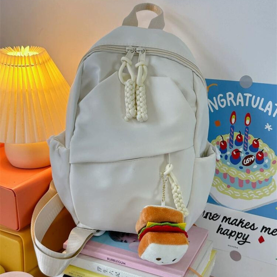 Solid color backpack design crossbody bag, chest bag with free pendant