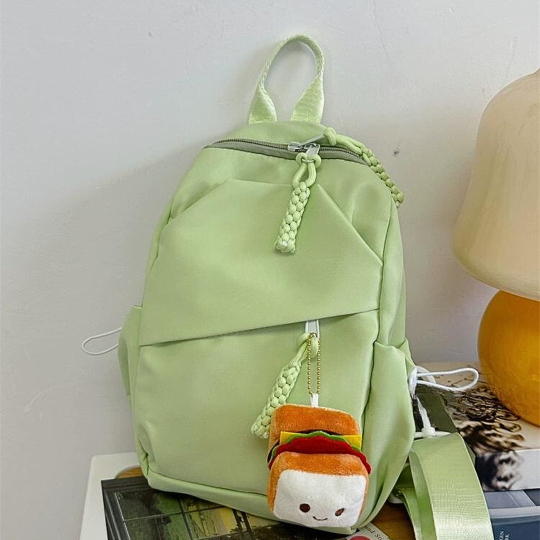 Solid color backpack design crossbody bag, chest bag with free pendant