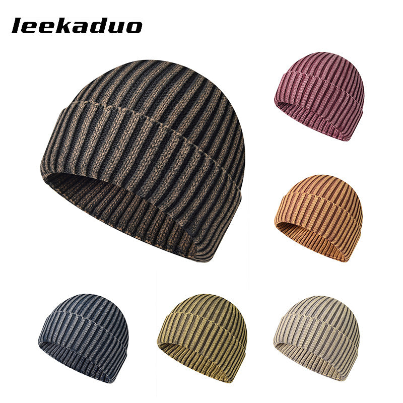 Graphite wash distressed knitted solid color beanie hat