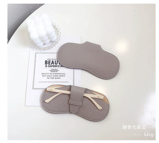 ল্যানিয়ার্ড সহ পোর্টেবল লেদার গ্লাস প্রতিরক্ষামূলক স্টোরেজ।