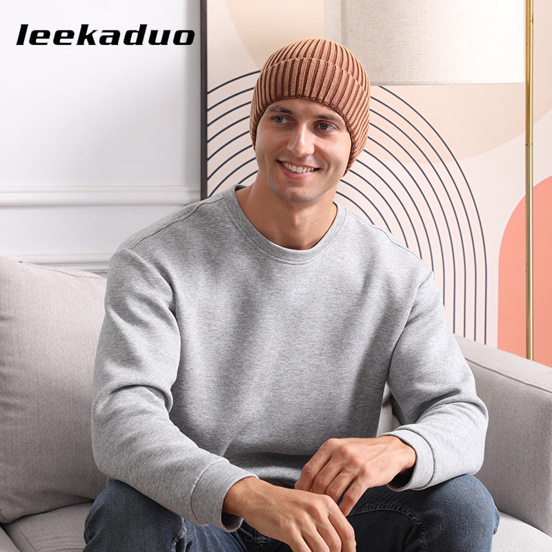 Graphite wash distressed knitted solid color beanie hat