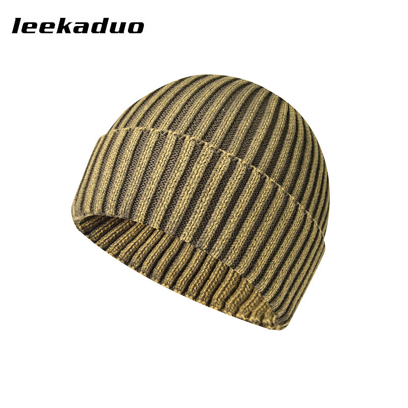 Graphite wash distressed knitted solid color beanie hat