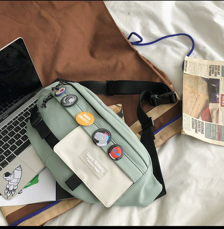 Unisex crossbody bag for travel and hiking with adjustable strap and free pendant