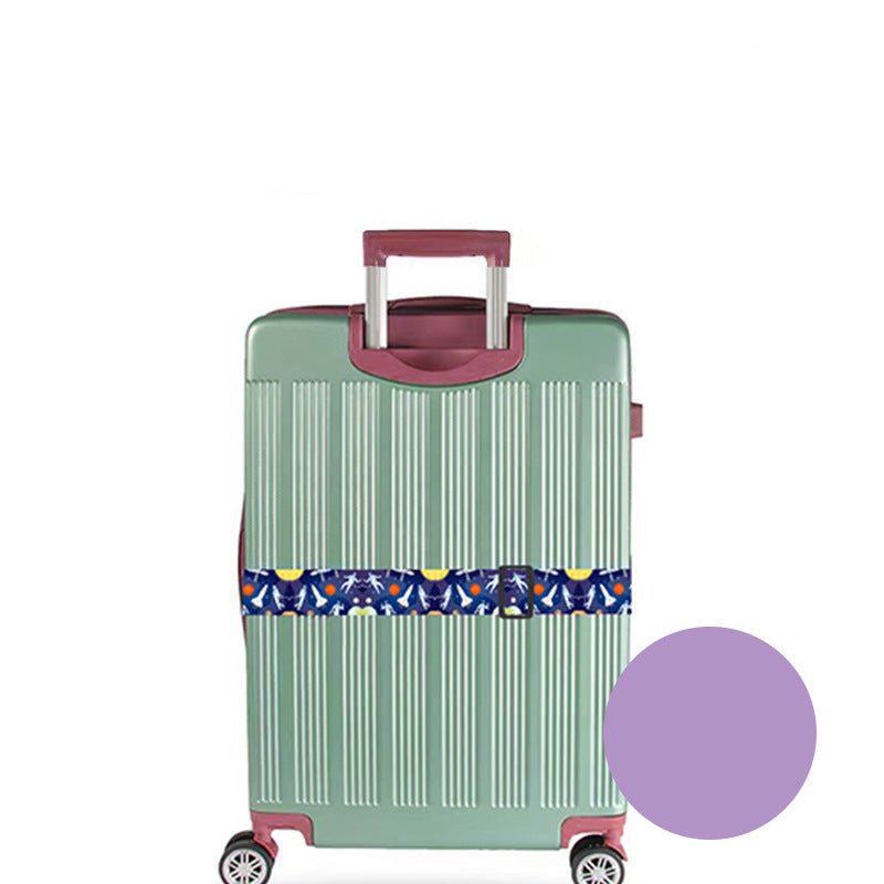 Green suitcase with a floral-patterned luggage strap on a white background
